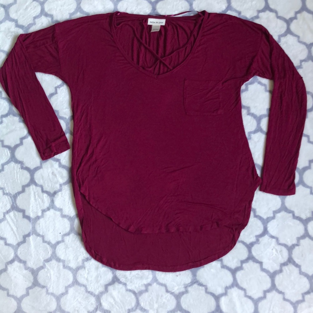 Red long sleeve top with cross cross